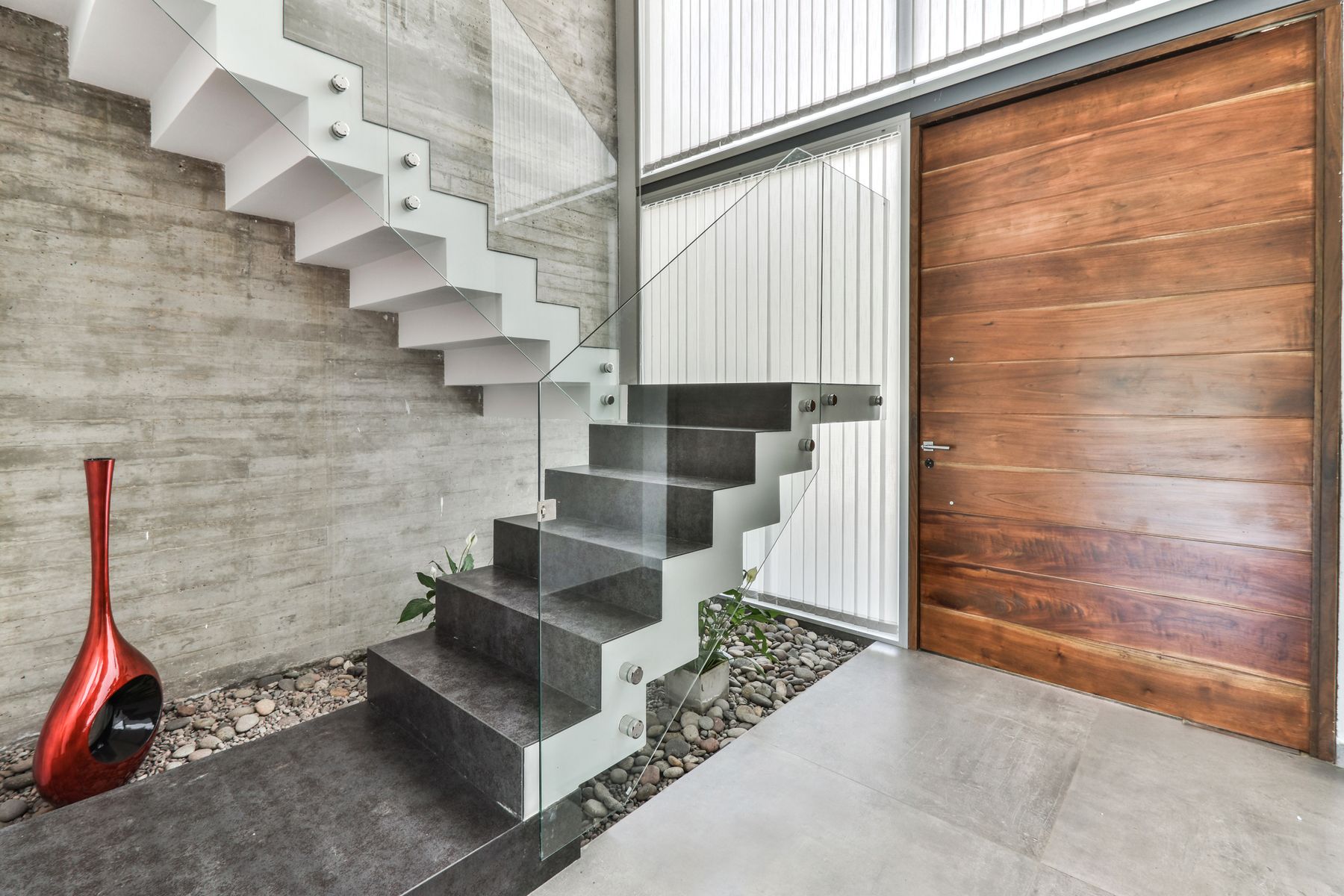 Casa KCC 52 — Escalera y acceso